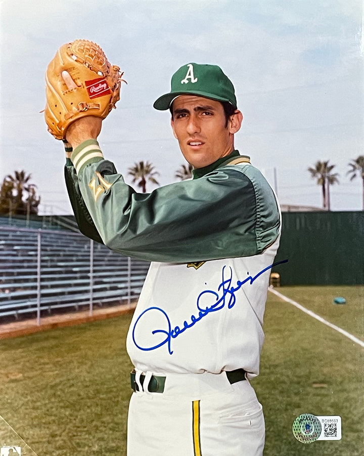 The Sports Integrity Rollie Fingers Signed 8x10 Oakland Athletics Baseball Photo (BAS) shows Fingers in uniform on the field, glove ready to pitch, with his blue autograph across the image.