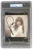 A Taylor Swift signed Tortured Poets Department CD insert from Sports Integrity is sealed in a case with a PSA/DNA certification label, indicating authenticity and a Gem MT 10 auto grade.