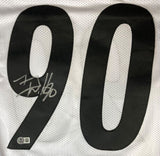 The Sports Integrity TJ Watt Pittsburgh Signed White Football Jersey BAS features bold black 90 numbers, a silver autograph on the left zero, and a small authenticity sticker at the bottom left.