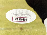 Close-up of a Sports Integrity oval sticker with signature, ISA letters, and serial WB540300 on a white background, affixed to a Brandon Graham Signed 8x10 Philadelphia Eagles Green Jersey Photo JSA.