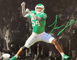 The Sports Integrity Jeremiah Trotter Jr Signed in Green 8x10 Philadelphia Eagles Spotlight Photo (JSA) features him (#54) celebrating on a black-and-white field, with his autograph in green ink.