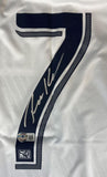 A close-up of the Sports Integrity Robbie Keane Signed Los Angeles Galaxy Soccer Jersey, showing a bold black number 7 with his autograph and two official stickers, including the MLS logo, at the bottom.