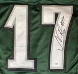 The Sports Integrity Nakobe Dean Philadelphia Signed Green Football Jersey features large white 17 numbers outlined in black, a black marker signature on the 7, and a PSA/DNA authentication sticker near the bottom.