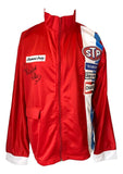 The Sports Integrity Richard Petty Signed Red Racing Jacket features white and blue right-side stripes, STP, Richard Petty, and Dodge by Petty patches, plus a left-chest autograph and JSA hologram.