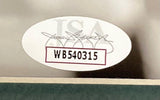 A white oval sticker with code WB540315 and a faint background signature appears on the Sports Integrity Brandon Graham Signed Framed 11x14 Eagles SB52 Strip Sack Photo (JSA verified); "JSA" is partially visible beneath the signature.