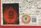 A Sports Integrity Ted Williams Signed Framed 16x20 Red Sox Photo (BAS LOA) features a holographic sticker with a red diamond and “9” (serial #007251) alongside a round authentication sticker with QR code “AC66421” on gray textured background.
