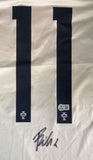The Joao Felix Signed Portugal Nike Soccer Jersey by Sports Integrity features a white jersey with black number 11, each digit displaying a small Portugal team logo, an authentication sticker, and Joao Felix’s autograph beneath the numbers.
