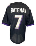 The Sports Integrity Rashod Bateman Baltimore Signed Black Football Jersey features his name and number 7 in white and gold, a signed #7, and purple and white accents. Authenticated by BAS.