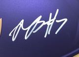 The Rashod Bateman Signed Ravens Full Size Alternate Speed Replica Helmet by Sports Integrity features a bold, slightly slanted white autograph with the number 17 on its dark purple surface.