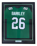 Sports Integrity’s Saquon Barkley Philadelphia Signed Framed Kelly Green Football Jersey features white numbers, “BARKLEY” nameplate, #26 with a left-side signature, and a plaque reading SAQUON BARKLEY.