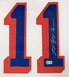 Two large blue number 1 patches with red outline form "11" on this framed Mark Messier New York signed white hockey jersey from Sports Integrity. The right patch displays Messier's autograph and a BAS authentication sticker.