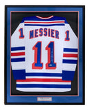 The Sports Integrity Mark Messier New York Signed Framed White Hockey Jersey BAS features his name and #11 in blue and red, with his signature on the right digit, and is displayed with a silver nameplate at the bottom.