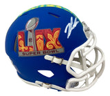The Sports Integrity Jalen Carter Signed Philadelphia Eagles Super Bowl LIX Mini Speed Helmet features a blue shell, colorful event logo, white facemask, and Carter's signature above the logo.