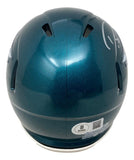 The Darius Slay Signed Philadelphia Eagles Mini Speed Helmet by Sports Integrity is teal, viewed from the back, with ventilation holes, a silver center stripe, and a certification sticker with a QR code near the bottom.