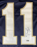 The Tommy Rees Notre Dame navy blue football jersey by Sports Integrity features large white and gold number 11, with one "1" signed in black marker and a small authentication sticker below the signature.