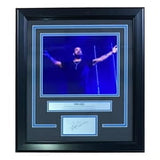 Sports Integrity's Drake Framed 8x10 Concert Photo features a performer on stage, a nameplate, and a laser engraved signature, all mounted on a black mat with blue trim inside a sleek black frame.