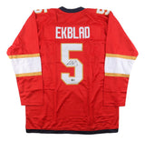 The Sports Integrity Aaron Ekblad Florida Signed Red Hockey Jersey BAS features gold and white stripes, Ekblad's name and number 5 on the back, and his autograph on the number.