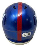The Sports Integrity Abdul Carter Signed New York Giants Mini Speed Helmet BAS w/ Case is blue, with a single red center stripe, ventilation slots, and a certification sticker near the bottom edge.