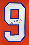 A large white number 9 outlined in blue appears on this orange custom Bobby Boucher football jersey from "The Waterboy," signed in black, with a JSA hologram. Framed by Sports Integrity.