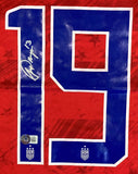 The Sports Integrity Alex Morgan Signed 2019/20 Nike USA Women's Champions Soccer Jersey features a large blue and white #19 autographed in white ink, with the USA crest below, three white stars above.