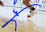 A close-up of Allen Iverson mid-jump on the court, in white shoes with red accents, is featured in this framed 8x10 photo autographed in blue. Sports Integrity offers this JSA ITP-certified 76ers vs Michael Jordan collectible.