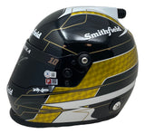 The Aric Almirola Signed NASCAR Smithfield Full Size Replica Racing Helmet by Sports Integrity is black and yellow with a honeycomb pattern, number 10, Smithfield branding, white and gold accents, and a dark visor.