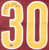 The Sports Integrity Austin Ekeler Washington Signed Burgundy Football Jersey BAS features large yellow 30 numbers, a small printed #30, Ekeler's black ink signature above the number, and an authentication sticker at the bottom.