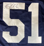 A Ken Norton Jr Dallas signed alternate blue football jersey by Sports Integrity featuring a large white number 51 and a black marker signature on the upper left corner of the 5.