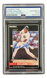 A Bernie Williams Signed 1992 Pinnacle #229 Yankees Trading Card by Sports Integrity, PSA certified as “Authentic Auto,” features Williams mid-swing in his batting uniform.