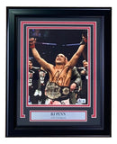 The Sports Integrity BJ Penn Signed Framed 8x10 UFC Championship Belt Photo features BJ Penn with arms raised, autograph on the image, and a plaque reading "BJ PENN UFC Champion." Authenticated by BAS.