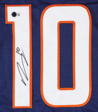 A close-up of the Bo Nix Denver Signed Alternate Blue Football Jersey by Sports Integrity, showing a large white number 10 outlined in orange with a black autograph on the number 1.