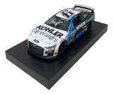 The Sports Integrity Brad Keselowski Signed 1:24 NASCAR Kohler Die-Cast Car features a blue and white No. 6 Ford with Kohler Generators branding, displayed on a black base, and comes PSA/DNA authenticated.