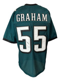 A Sports Integrity Brandon Graham Philadelphia Eagles green football jersey, featuring "GRAHAM" and white number 55 on back, signed in black marker. Includes JSA QR hologram authentication.