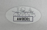 A JSA oval sticker (code AW08301) with a signature appears on the Brooks Koepka Signed Framed 124th PGA US Open Golf Flag by Sports Integrity, shown on a textured white background.