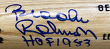 A close-up of a Brooks Robinson Orioles Signed Tan Louisville Slugger Bat by Sports Integrity, showcasing a blue autograph with "HOF 1983" inscribed, authenticated by JSA.