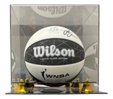 The Sports Integrity Caitlin Clark Fever Signed Wilson WNBA Signer Edition Basketball (PSA/DNA) is displayed in an acrylic case with gold corner supports, reflecting the ball and accents on its inner surfaces.