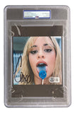 A Camila Cabello Signed Slabbed C,XOXO CD Insert by Sports Integrity, encased in a graded protective case with certification labels at the top.