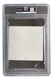 The Camila Cabello Signed Slabbed C,XOXO CD Insert by Sports Integrity is encased in a PSA holder, showing the back of a blank white card with a small MAGNIFIER label below. The PSA label and barcode are visible at the top of the case.