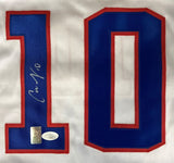 A close-up of the Carli Lloyd USA Signed White Soccer Jersey by Sports Integrity, showing a large blue and red number 10 with Lloyd's signature on the number 1 and two authenticity stickers below.