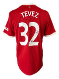 Sports Integrity Carlos Tevez Signed Manchester United Red Adidas Jersey, featuring white trim, TEVEZ and number 32 on the back with a small autograph near the right side of the "2." BAS authenticated.
