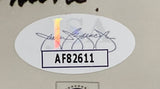 A Cheech & Chong "Up In Smoke" 8x10 photo by Sports Integrity, signed and framed, includes a JSA AF82611 oval sticker with a holographic strip, signature, and bold black code on a white background.