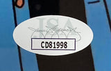 A close-up of an oval JSA authentication sticker featuring a black signature and code CD81998 on the Cheech & Chong Signed Framed 8x10 The Simpsons Photo 2 by Sports Integrity.
