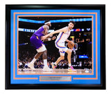 Sports Integrity’s Chet Holmgren Signed Framed 16x20 Oklahoma City Thunder Photo features him dribbling past a defender, with an orange signature and JSA hologram.