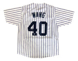 The Sports Integrity Chien Ming Wang New York Signed White Baseball Jersey features black pinstripes, "WANG" and number 40 on the back, with Wang’s autograph on the number 4. PSA/DNA Hologram included.