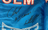 A close-up of Sports Integrity's Chuck Liddell Signed Iceman UFC MMA Trunks, featuring bold white and red accents with two large autographs in black marker and a PSA/DNA hologram.