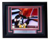 The Sports Integrity CM Punk Signed Framed 8x10 WWE Pipe Bomb Photo features CM Punk cross-legged in the ring, wearing a Stone Cold shirt and yellow boots, with a plaque reading "The Pipe Bomb June 27, 2011.