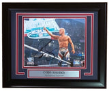 Framed 8x10 photo of Cody Rhodes at WWE Royal Rumble, autographed and signed, from Sports Integrity. Includes nameplate; authenticated by Fanatics.