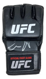 A Conor McGregor signed black UFC fight glove from Sports Integrity, featuring white UFC logos and an autograph, displayed against a white background.