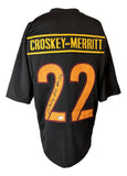 The Sports Integrity Jacory Croskey-Merritt Washington Black Football Jersey features yellow and red accents, "Croskey-Merritt" and number 22 on the back, and is signed in black marker, authenticated by BAS.