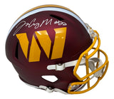 The Sports Integrity Jacory Croskey-Merritt Signed Washington Commanders FS Replica Speed Helmet features a maroon finish, gold W logo, yellow facemask, and a white autograph on the top left.